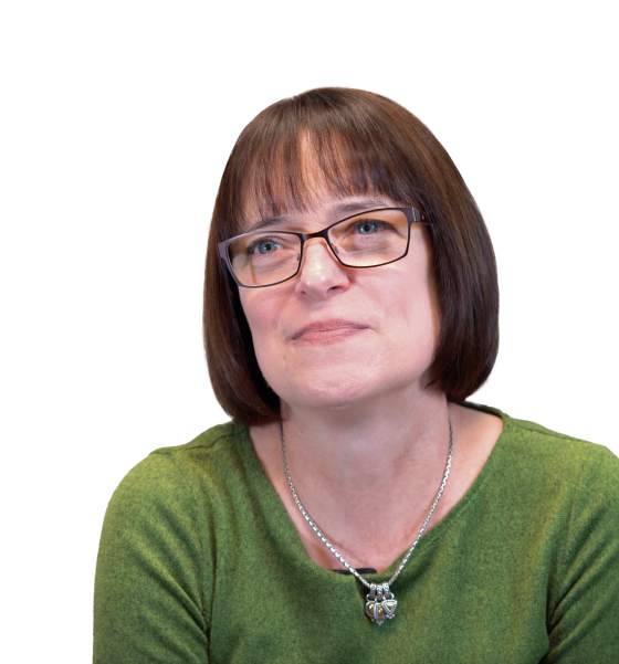 a woman wearing glasses and a green shirt